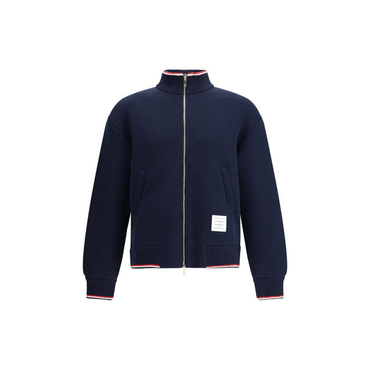 Thom Browne Blue Cotton Bomber with front zip and tricolor accents, featuring a logo patch, perfect for modern and refined fall fashion.