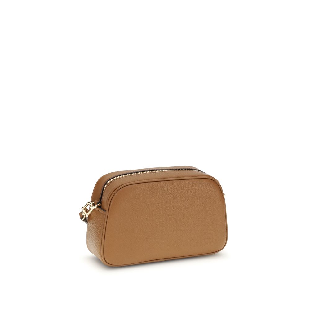 Front view with bag zipped and handles upright.