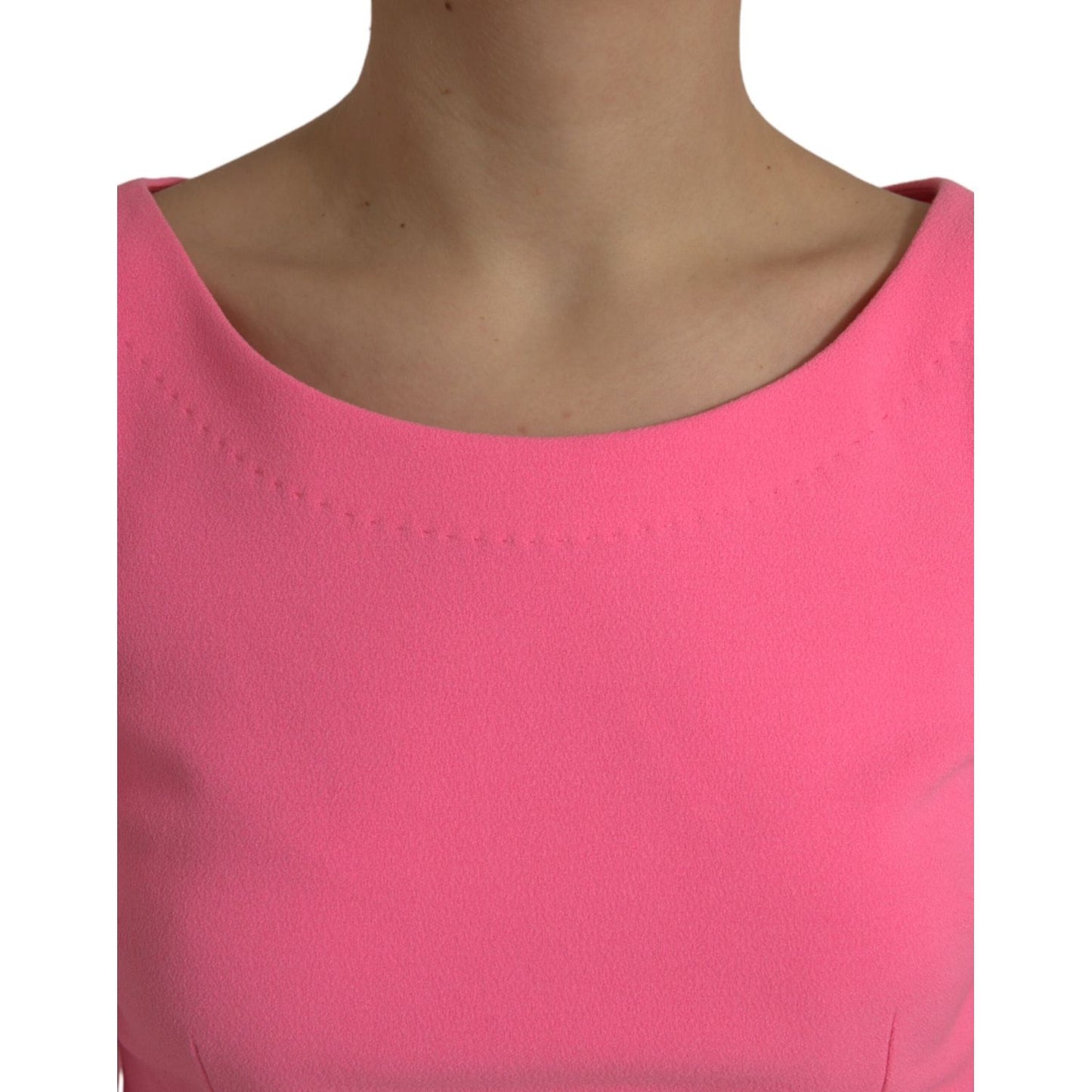 Close-up of Dolce & Gabbana Pink Polyester Long Sleeves Sheath Midi Dress neckline detail.