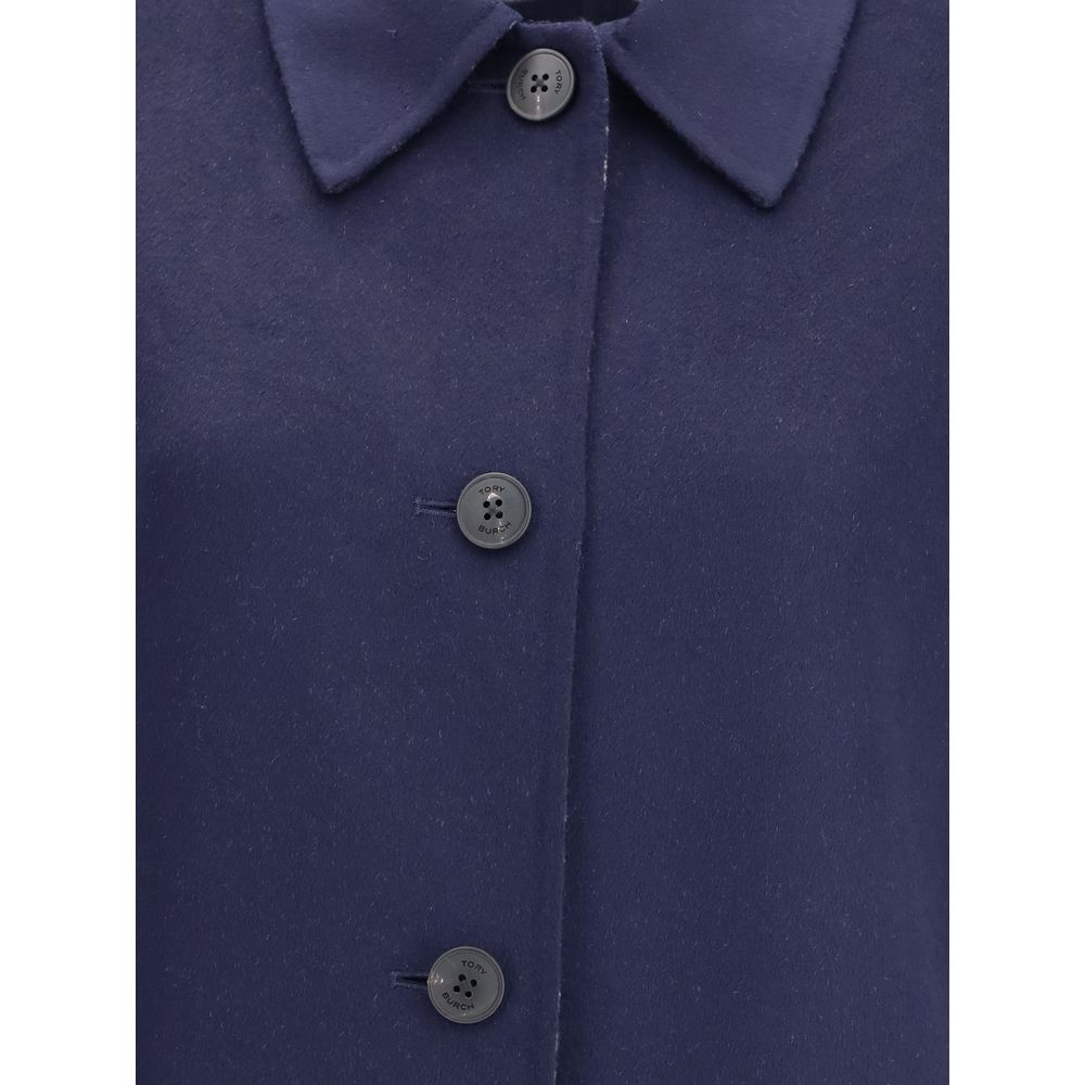Tory Burch Blue Wool Coat featuring button closure and soft texture, showcasing sophisticated style and practicality.