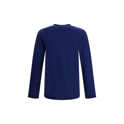 Back view of Comme Des Garçons Blue Wool Sweatshirt showcasing long sleeves and ribbed texture, designed for autumn-winter elegance.