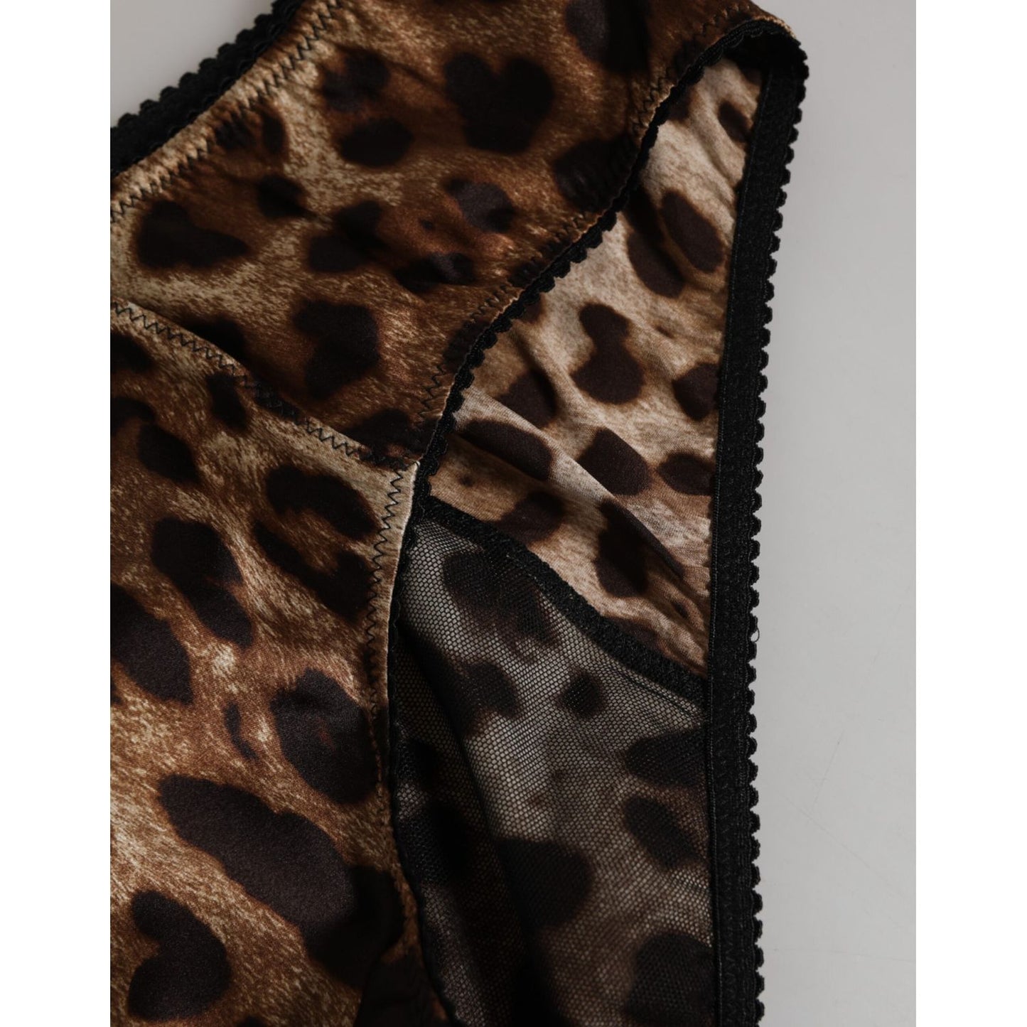 Close-up of Dolce & Gabbana Brown Leopard Silk Mid Waist Panty Underwear with leopard print and lace details.