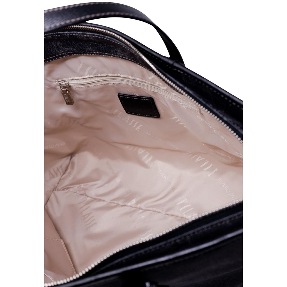 Interior view of Alviero Martini Prima Classe Black Polyester Handbag showing beige lining and zipper pocket.