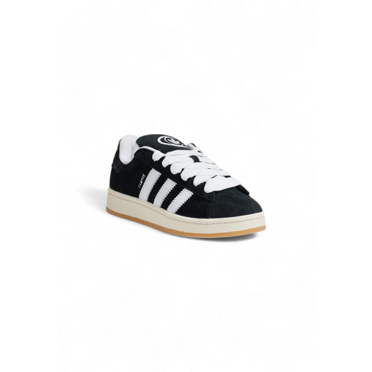 Adidas Black Suede Leather Sneaker with iconic three stripes and rubber sole for comfort and style, perfect for everyday wear.