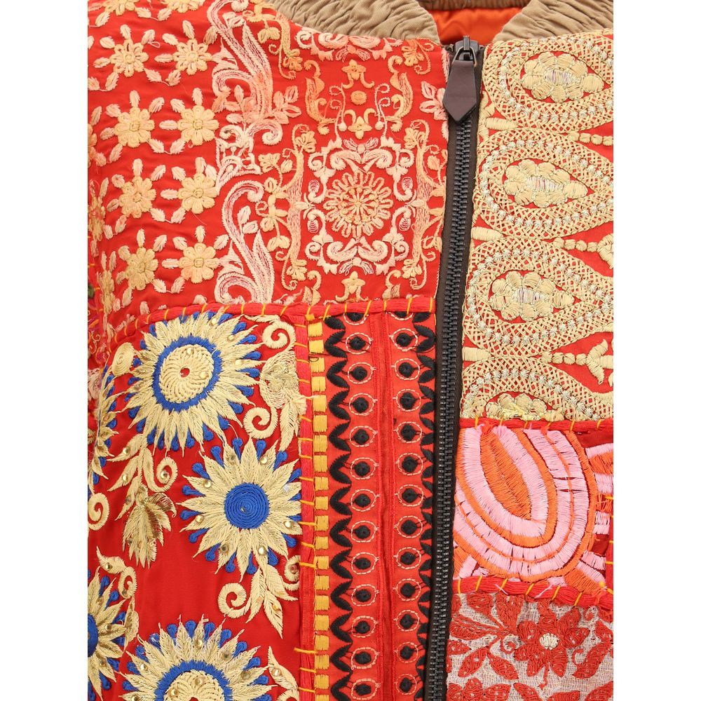 Close-up of Ella Multicolor Cotton Bomber showcasing intricate patchwork design with vibrant embroidered inserts and zip fastening.