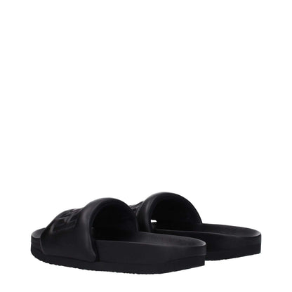 Ambush Black Leather Slippers with open toe and rubber sole, featuring a front logo design, model BMIC001LEA0011000.