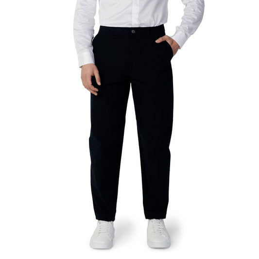 Model wearing Armani Exchange Blue Cotton Pant with regular fit and side pockets, showcasing stylish and breathable men's trousers.