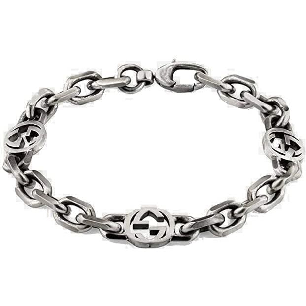 BRACCIALI GUCCI MOD. YBA620798001 silver link bracelet with iconic logos, showcasing luxury fashion design and craftsmanship.