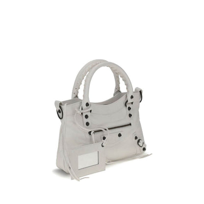 Balenciaga White Calf Leather Bos Taurus Handbag with hand-woven handles and brass hardware, featuring a zippered closure.