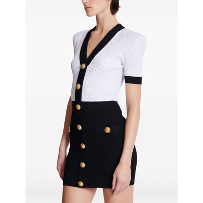 Balmain Two-tone twisted knit bodycon dress Dresses