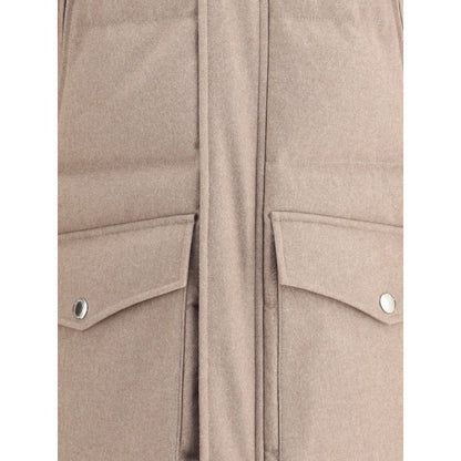 Close-up of Brunello Cucinelli Beige Cashmere Coat showing front flap pockets and detailing.