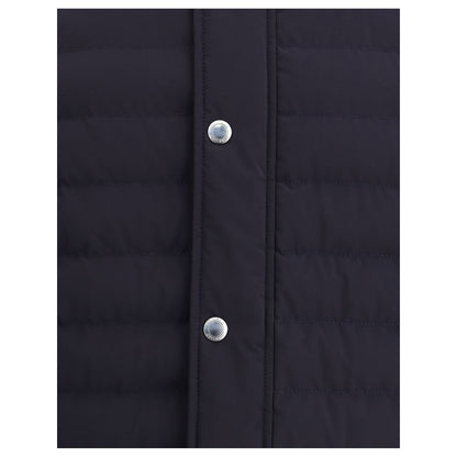 Close-up of Brunello Cucinelli Blue Polyester Coat showing snap-button closure detail