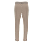 Back view of Brunello Cucinelli Lurex-detail trousers in taupe grey, featuring elasticised waistband and cuffed hems.