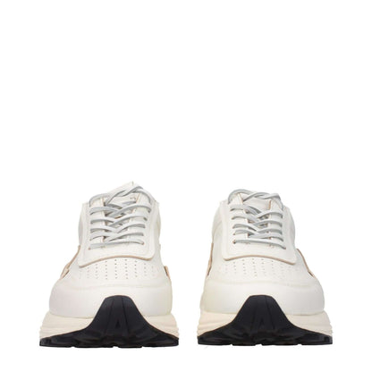 Buttero White Leather Low Top Sneakers with lace-up closure, rubber sole, round toe, and mid heels viewed from the front.