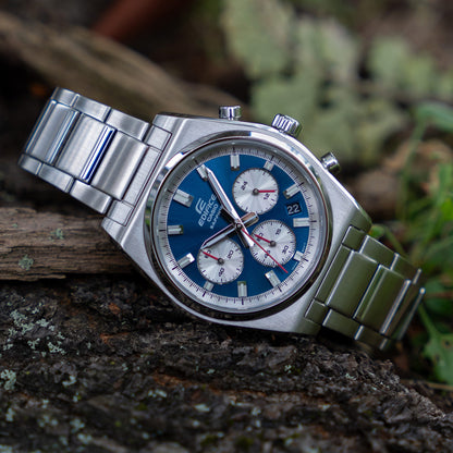 CASIO EDIFICE Mod. MOTORSPORT CHRONOGRAPH BLUE wristwatch with stainless steel strap and sapphire dial, displayed outdoors.
