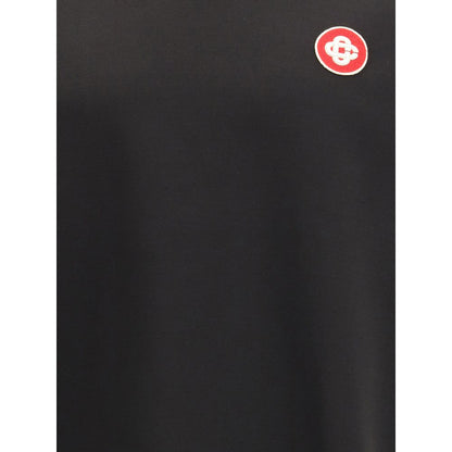 Casablanca Black Viscose Polo Shirt with logo patch, soft texture, short sleeves, perfect for warm weather.