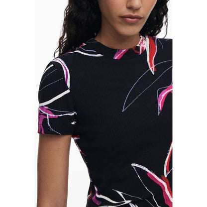 Model wearing Desigual Black Viscose Women Top featuring signature print and snug crew neck.