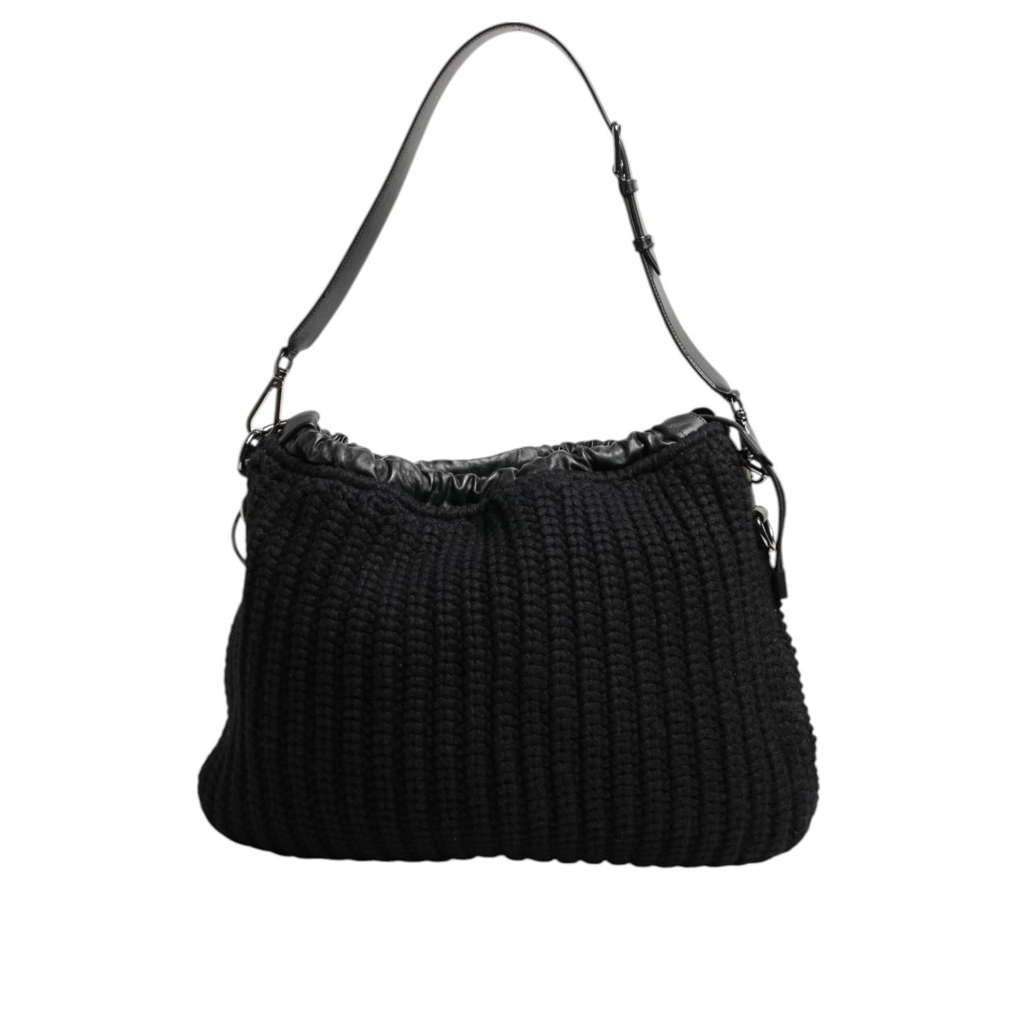 Front view with bag zipped and handles upright.
