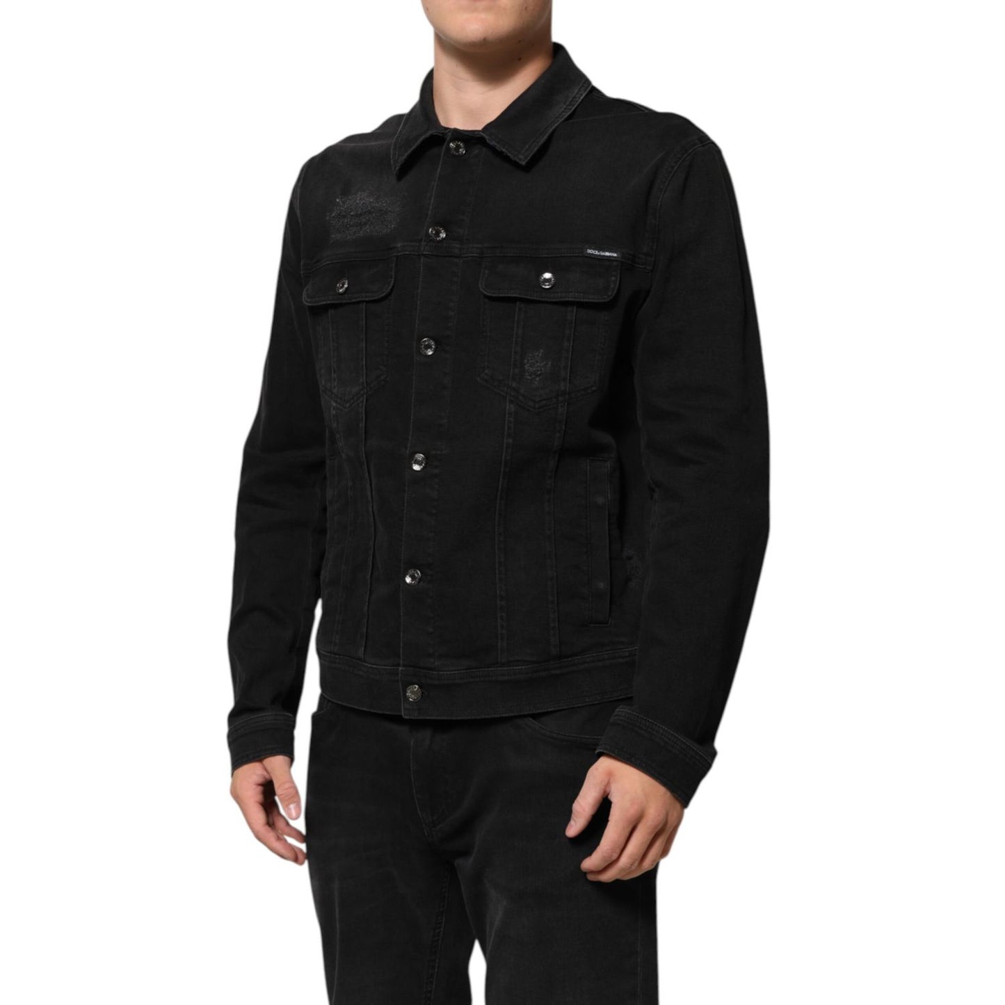 Dolce & Gabbana Black Cotton Denim Stretch Button Up Jacket with chest flap pockets and button closure, worn by a model.