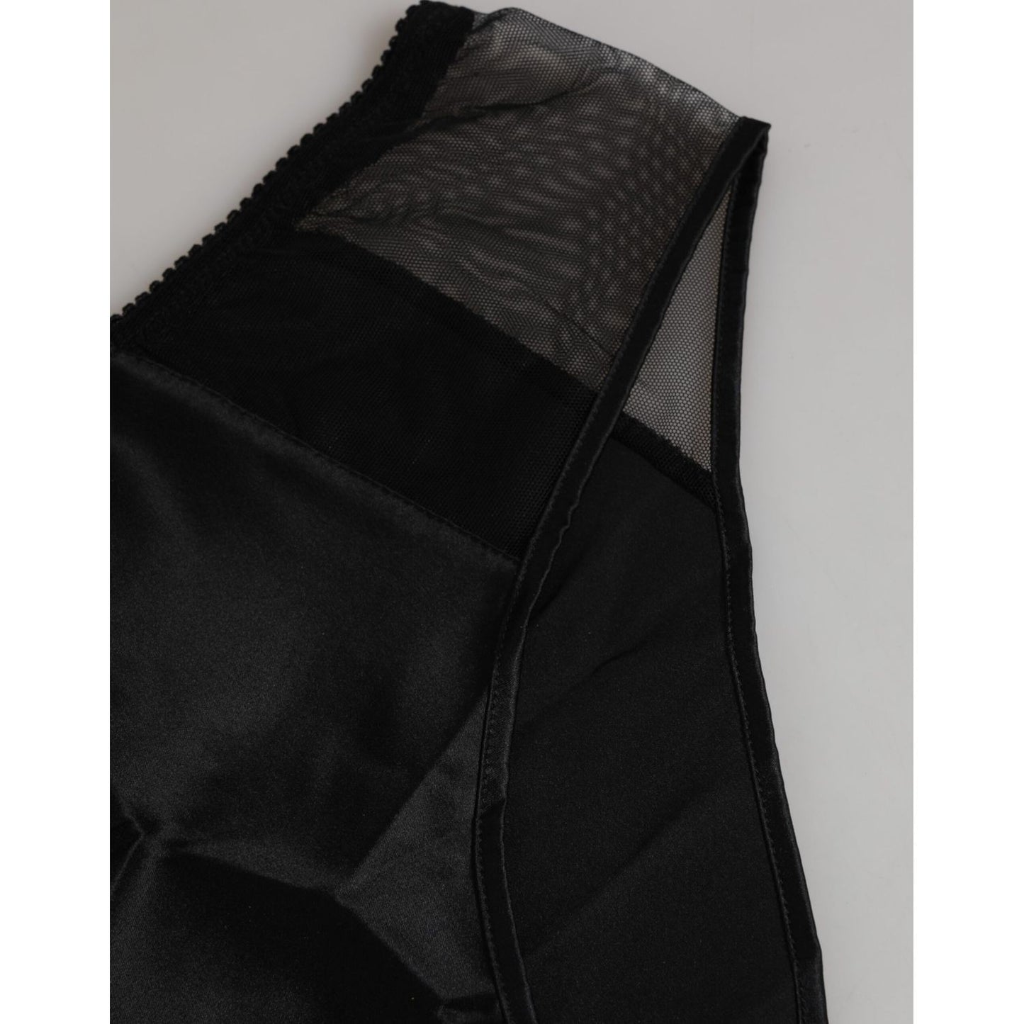 Close-up of Dolce & Gabbana Black Silk Stretch High Waist Panty Underwear featuring soft fabric and elegant design.