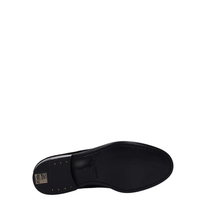 Sole view of Dolce & Gabbana Black Velvet Slip-On Loafers with leather sole and round toe design.