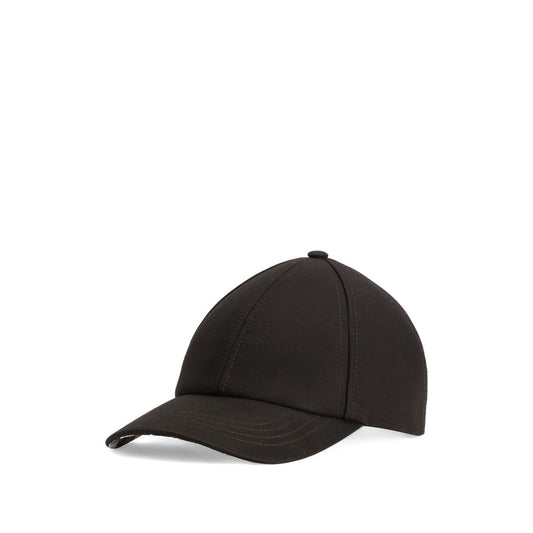Dolce & Gabbana Cotton baseball cap with black tonal stitching and curved brim, featuring an adjustable strap and logo detailing at the back.