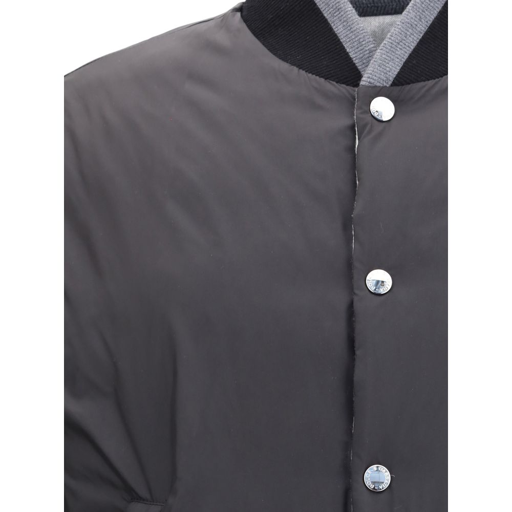Close-up of Dolce & Gabbana Gray Cotton Bomber showing snap button closure and ribbed collar details.