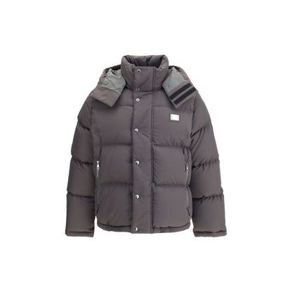 Dolce & Gabbana Gray Padded Down Jacket Polyester Coat with high collar, zipper, and snap closure, featuring removable hood and logo plaque.