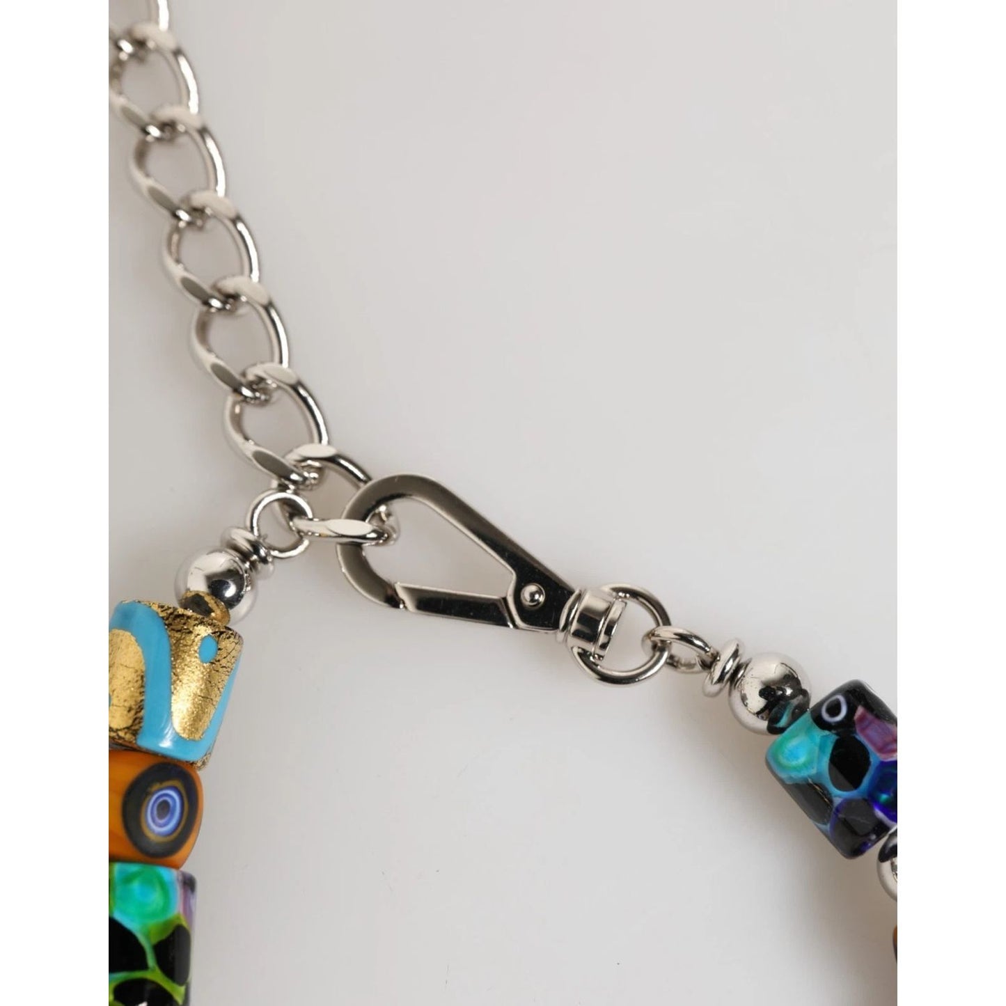 Close-up of Dolce & Gabbana Multicolor Murano Glass Beads Brass Zamak Necklace clasp and chain detailing.