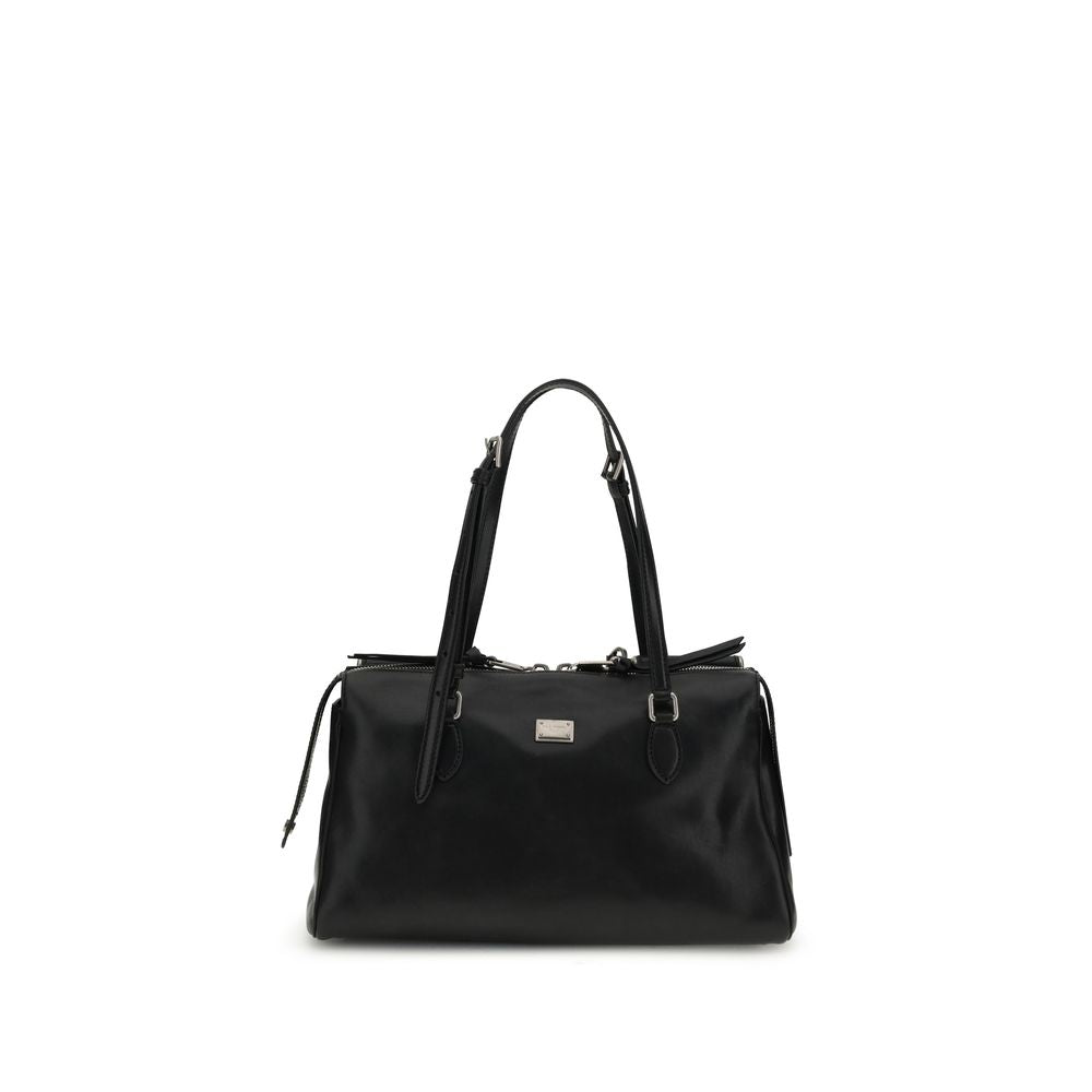 Front view with bag zipped and handles upright.
