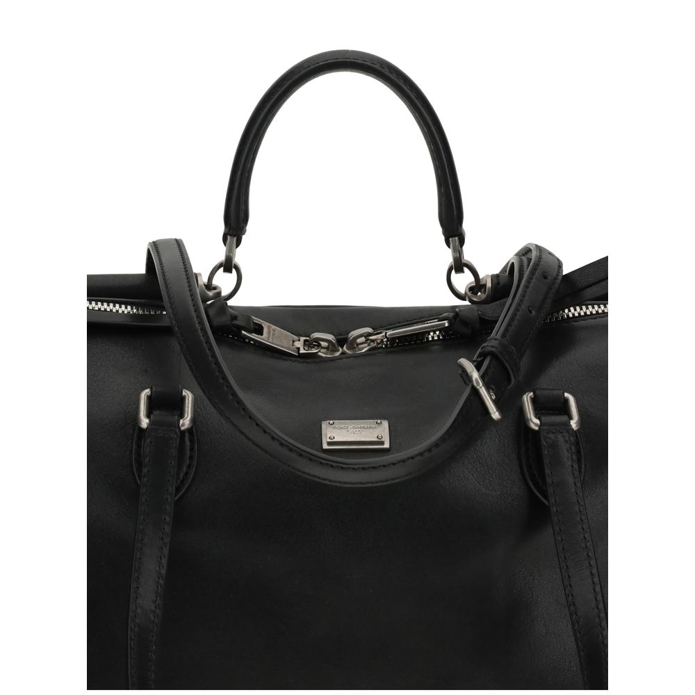 Front view with bag zipped and handles upright.