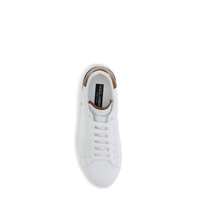Dolce & Gabbana White Calf Leather Bos Taurus Low Top Sneakers with logo stripe, round toe, and lace-up front, top view.