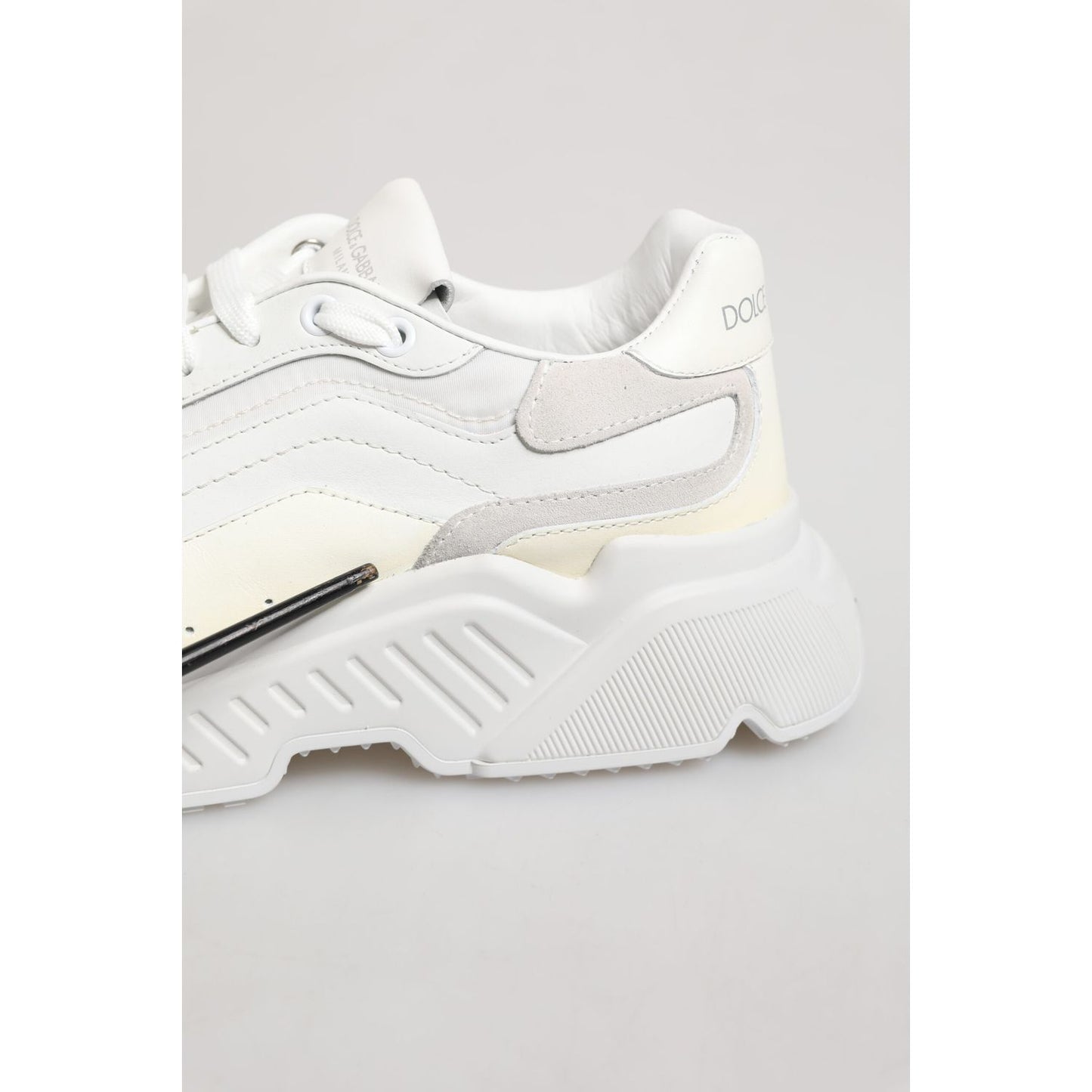 Dolce & Gabbana White Daymaster Low Top Mens Sneakers Shoes close-up showing chunky sole and sleek design