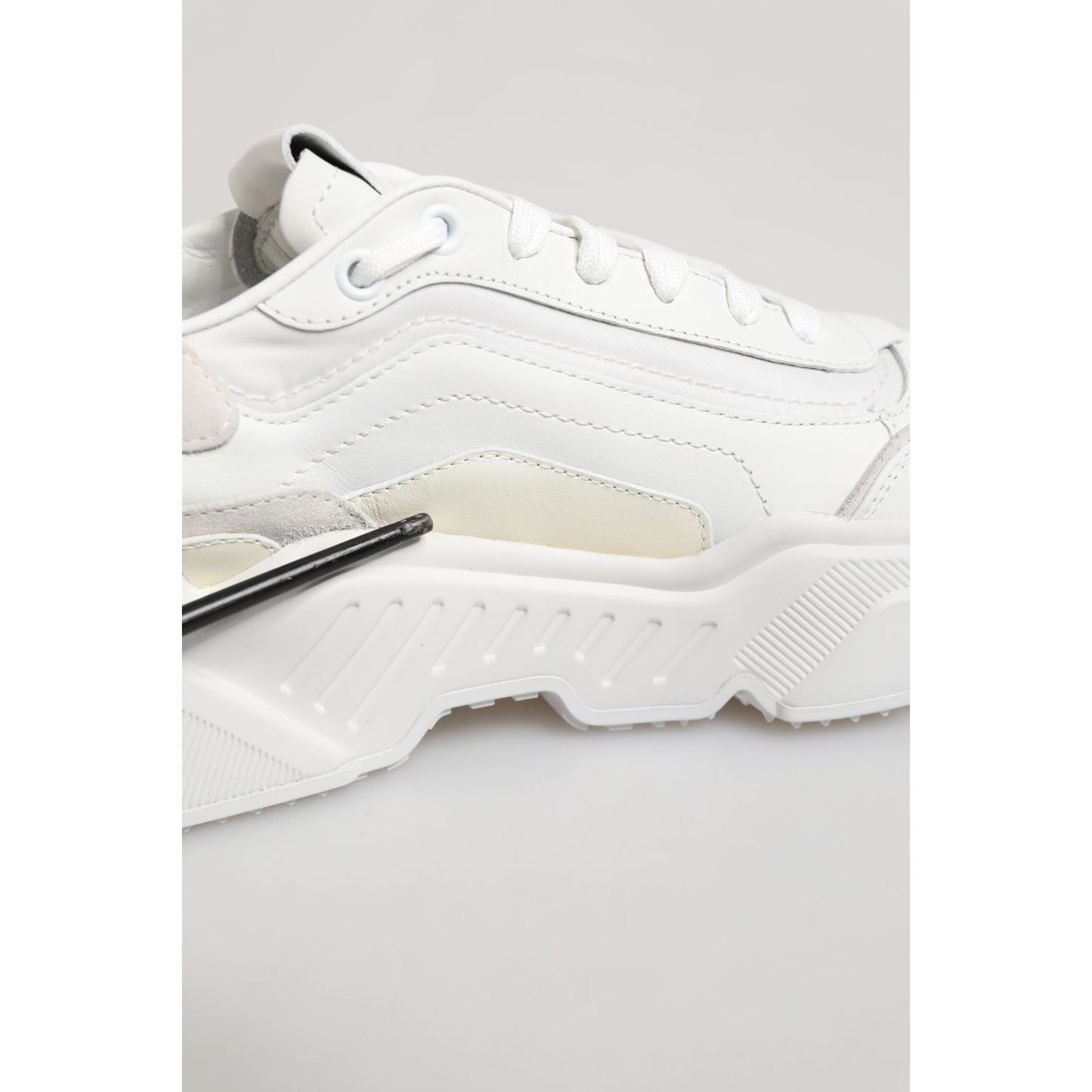 Close-up of Dolce & Gabbana White Daymaster Low Top Mens Sneakers Shoes featuring a chunky rubber sole and premium materials.