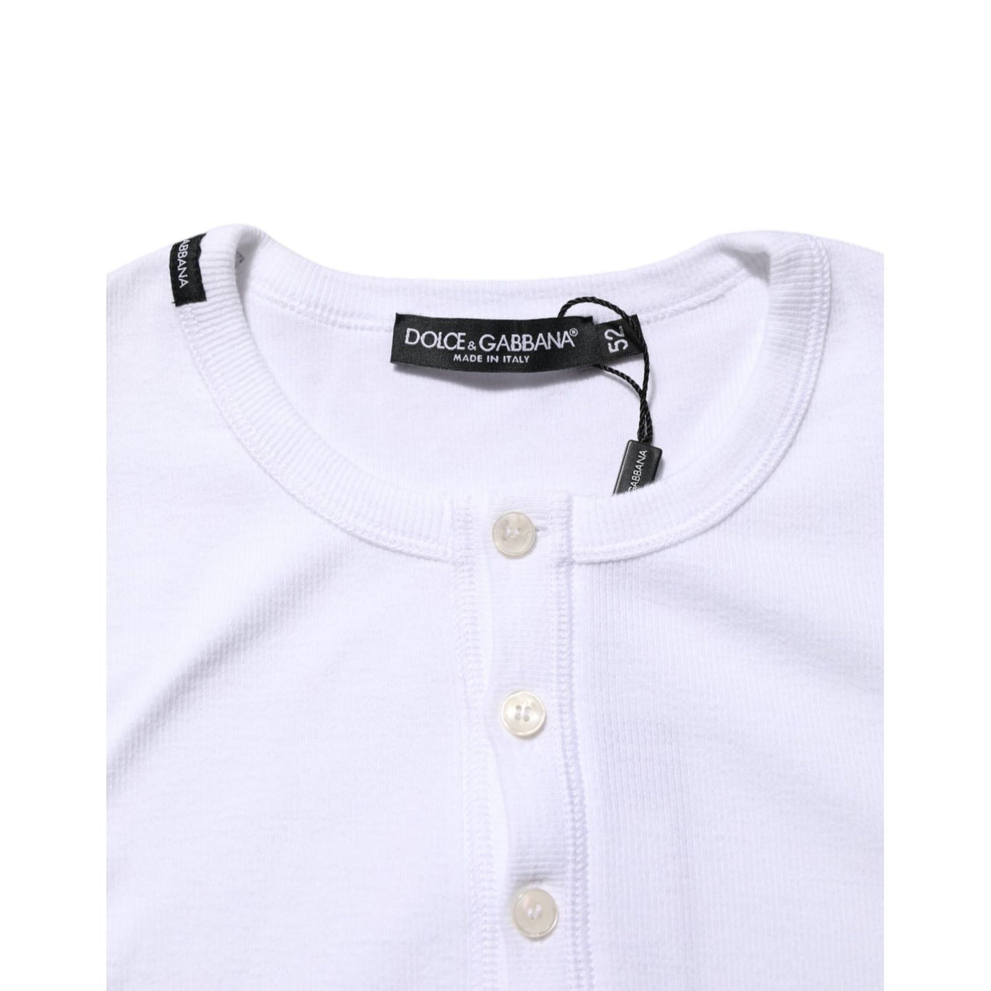 Dolce & Gabbana White Long Sleeves Button Closure T-shirt with tag, featuring soft cotton fabric and button-up neckline, close-up view