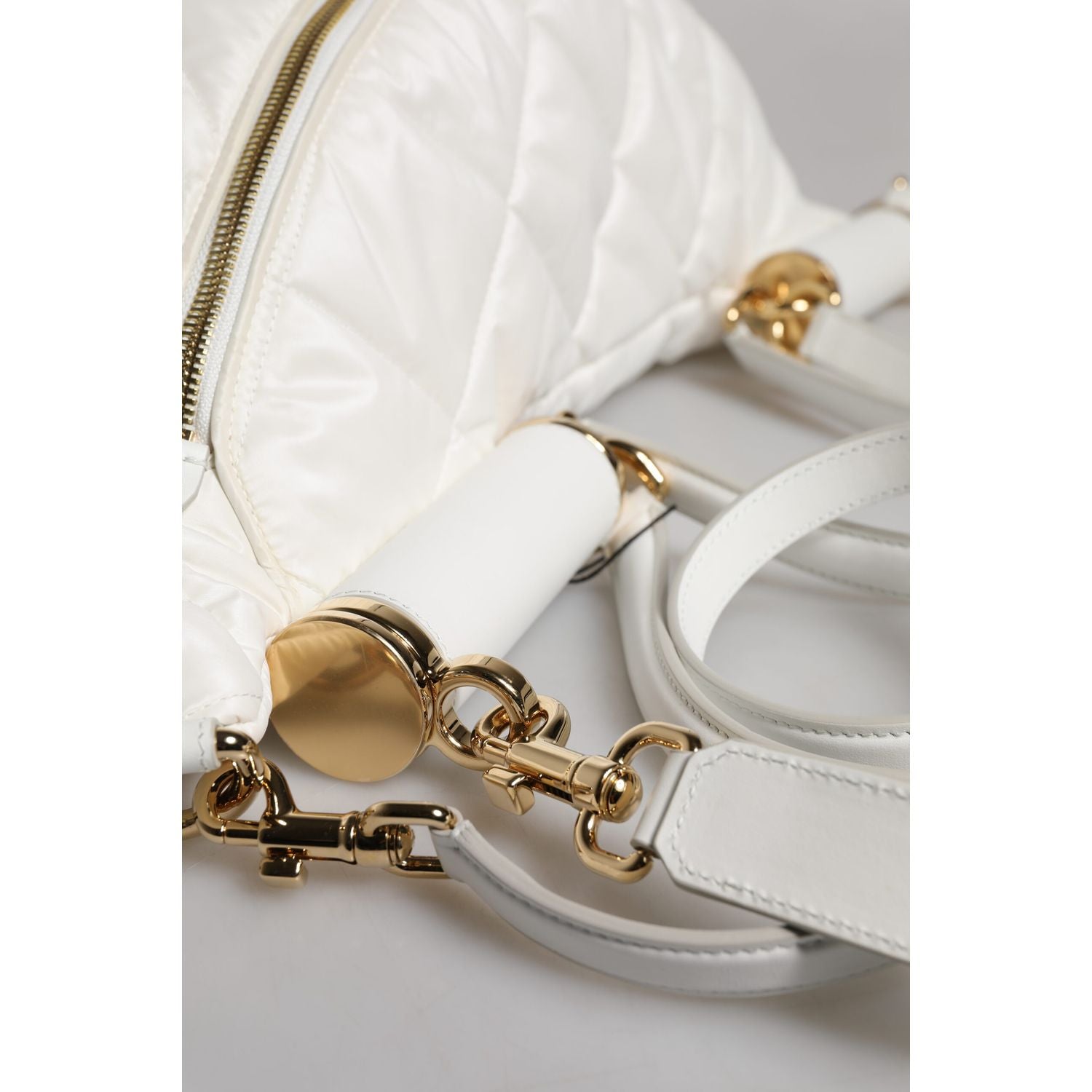 Front view with bag zipped and handles upright.