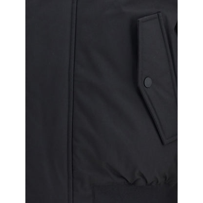 Close-up of Dsquared² Black Polyester Bomber showcasing pocket detail, ribbed elastic hem, and padded texture.