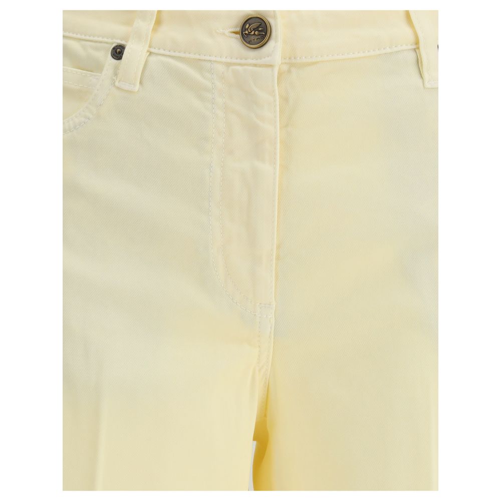 Close-up of Etro Yellow Cotton Straight-Leg Jeans showcasing button and zipper closure with belt loops.