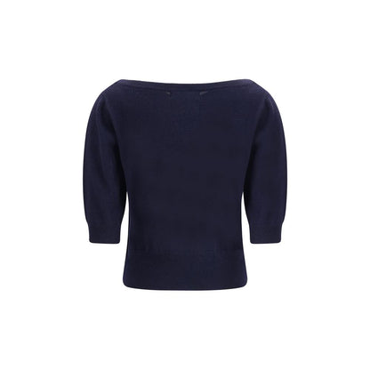 Extreme Cashmere Blue Cashmere Cashmere Sweater with crew neck and short sleeves, showcasing a structured design top view.