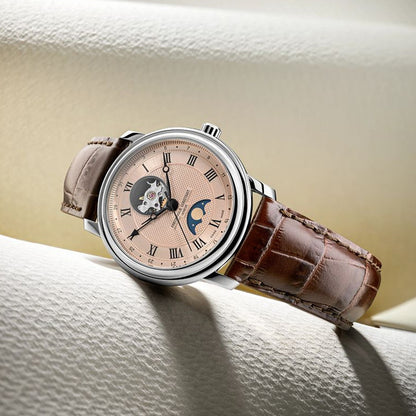 FREDERIQUE CONSTANT WATCHES Mod. FC-335MCSALB4P26 with brown leather strap and moon phase feature on a textured background.
