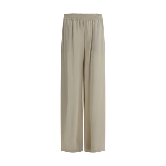 Fabiana Filippi Silk Pants with an elasticized waistband and straight leg design, featuring two side welt pockets for a modern look.