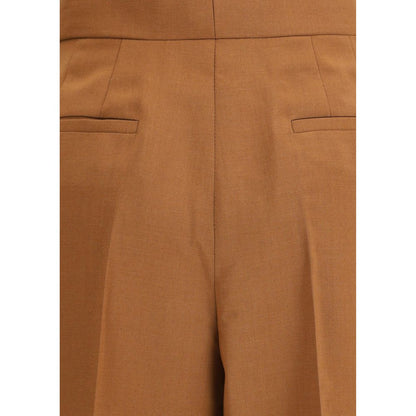Close-up of Fendi Brown Wool Flared Pants showing high-waist detail and side pockets, highlighting their elegant style and craftsmanship.