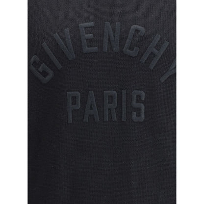 Givenchy Black Cotton Sweatshirt with embossed logo on chest, ribbed crew neck, cuffs, and hem. Made in Italy, elegant and comfortable design.