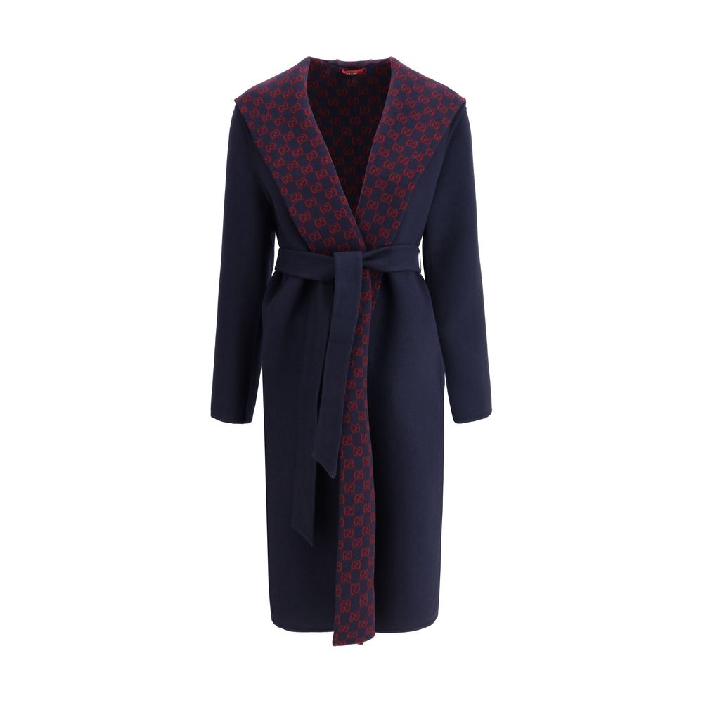 Gucci Blue Wool Coat with hood, knotted sash, side welt pockets and Gucci monogram inner panel for timeless elegance and practicality.