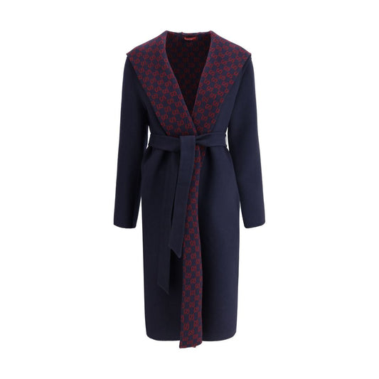 Gucci Blue Wool Coat with hood, removable sash, side pockets, and iconic monogram contrasting the monochrome pattern.