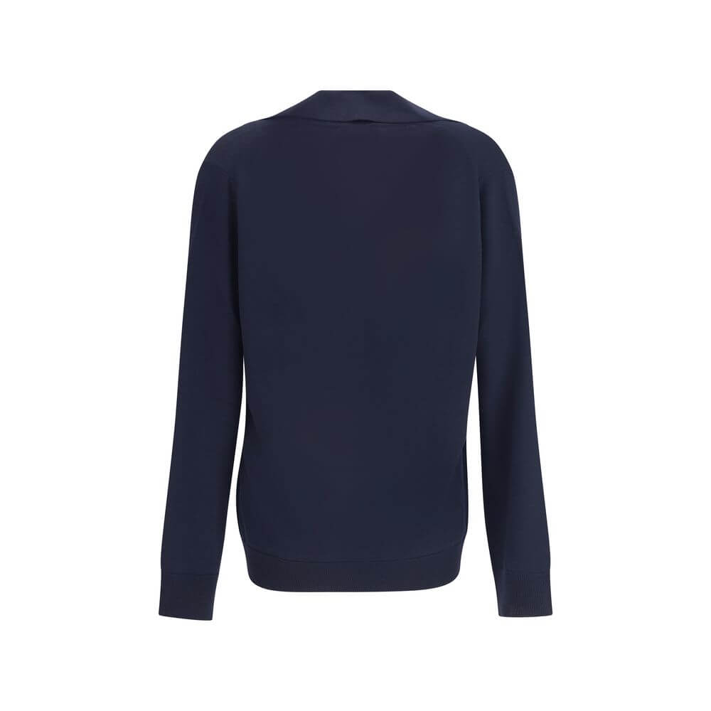 Back view of Gucci Blue Wool Sweatshirt with long sleeves and ribbed trims, showcasing relaxed elegance and subtle embroidered logo.