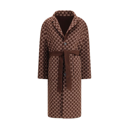 Gucci Brown Wool Coat with reversible GG patterned silk wool and notch lapels, sophisticated and versatile fashion piece.