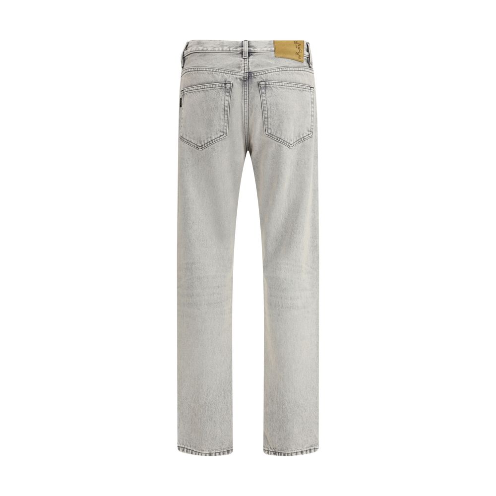 Haikure Light Blue Cotton Straight-Leg Jeans with five-pocket design, rivets, custom buttons, and zip-and-button closure, rear view.