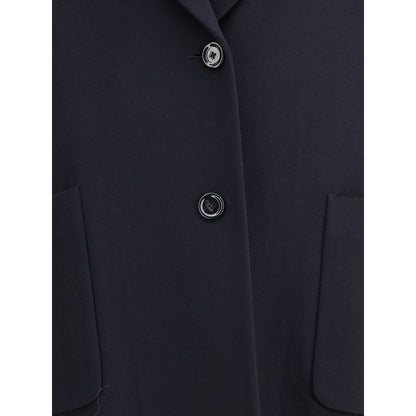 Close-up of Lardini Black Cashmere Coat with button closure and patch pockets, showcasing a modern sleek design.