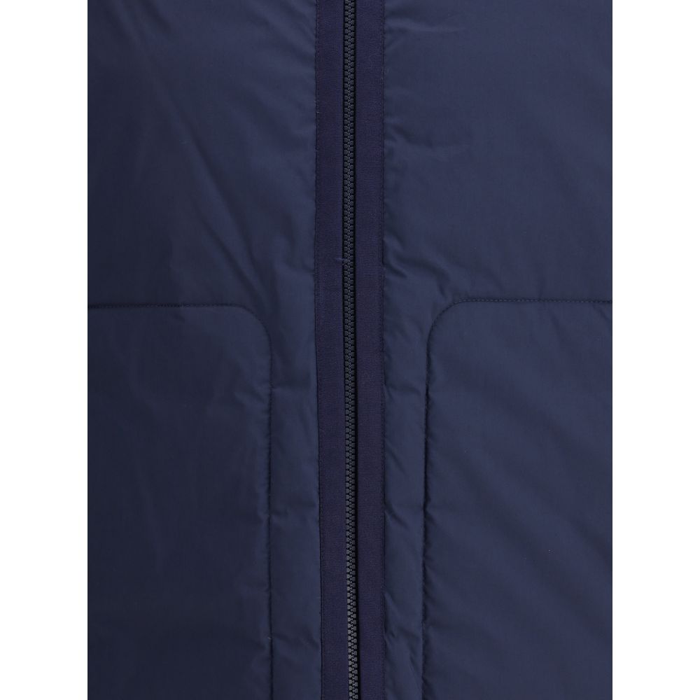 Close-up of Moncler x Donald Glover Blue Goose Down Full-Length Jacket featuring zipper and quilt detail.